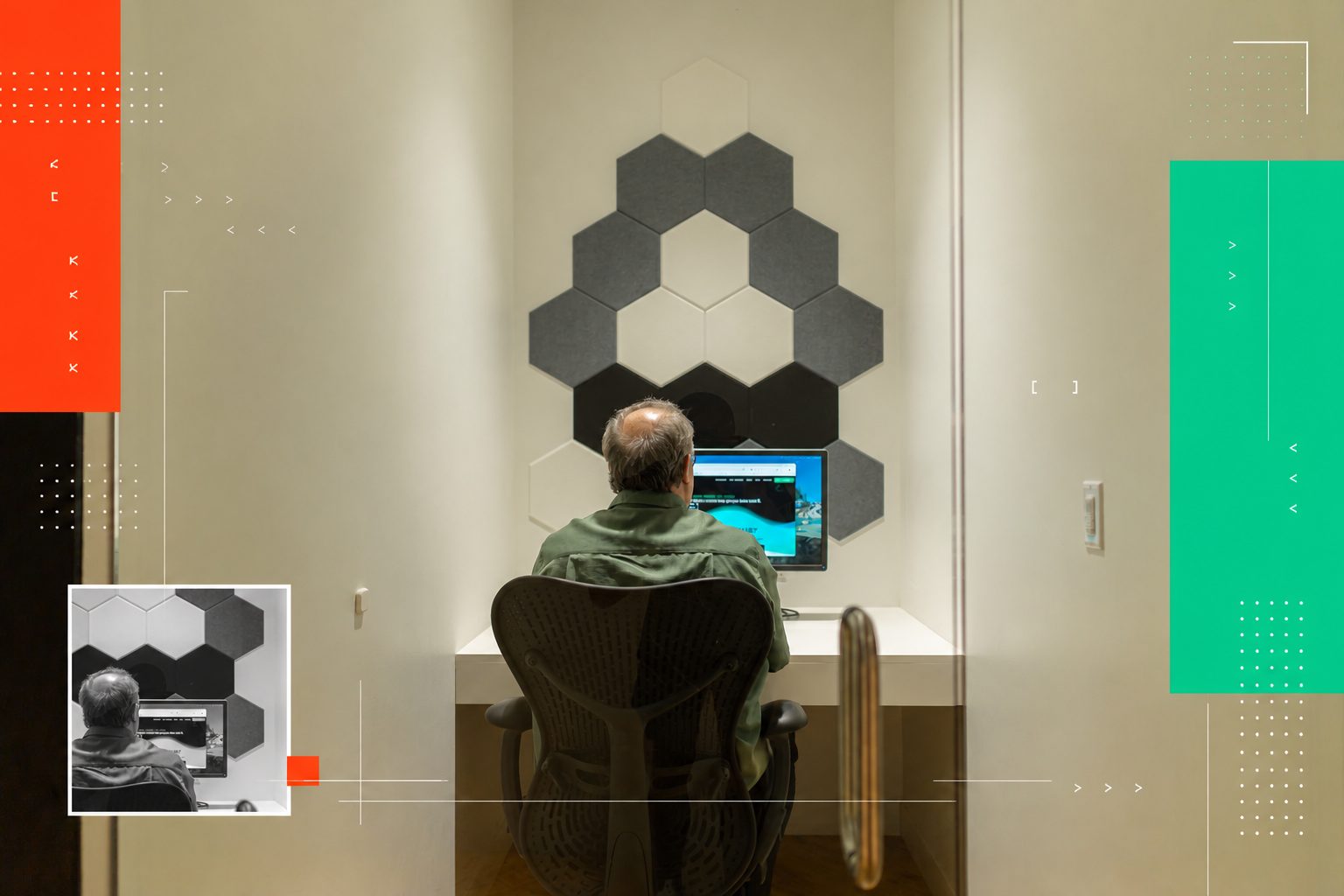 A developer working at a focus desk in the WWC office