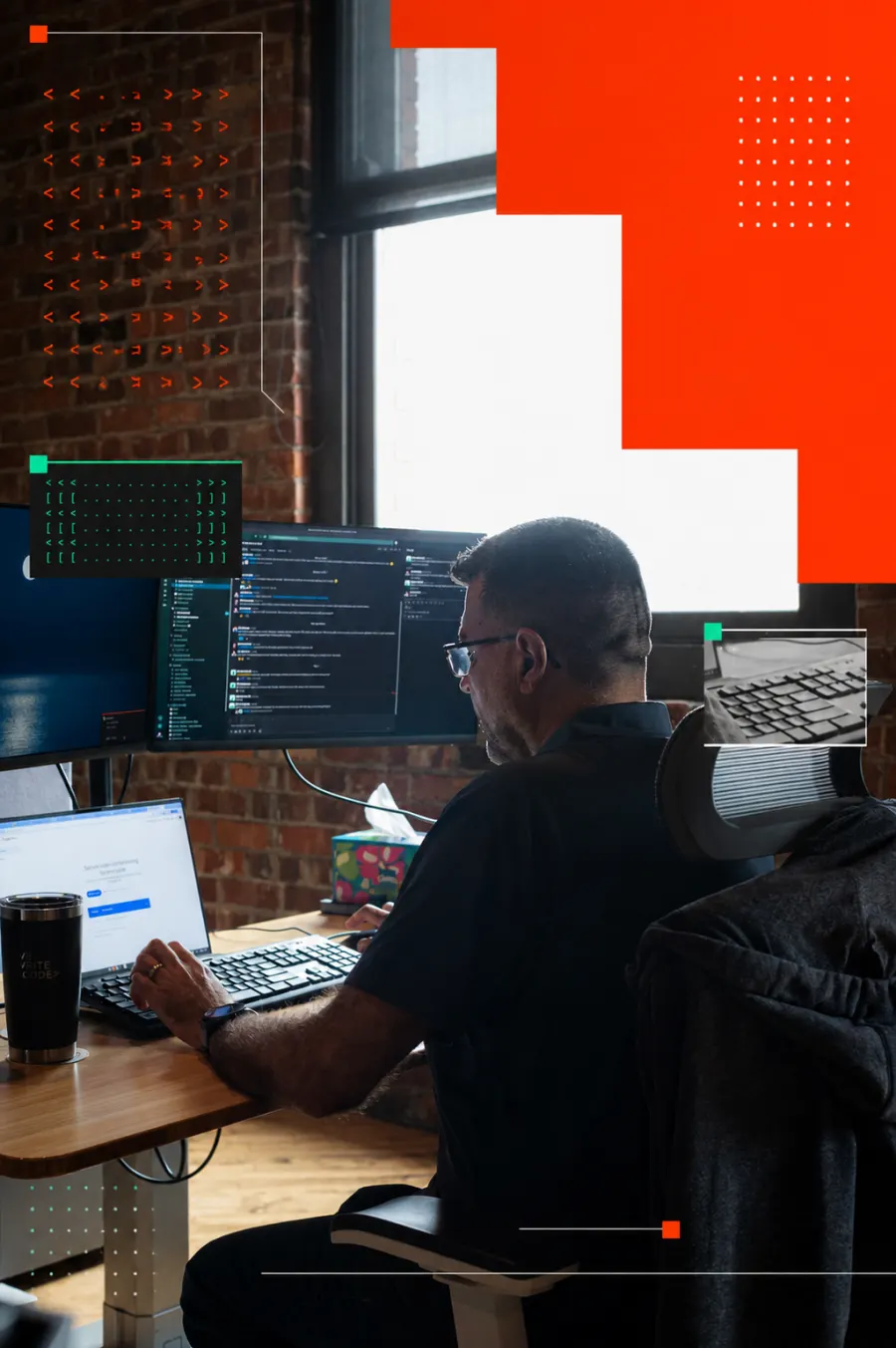 Developer working on code with multiple monitors