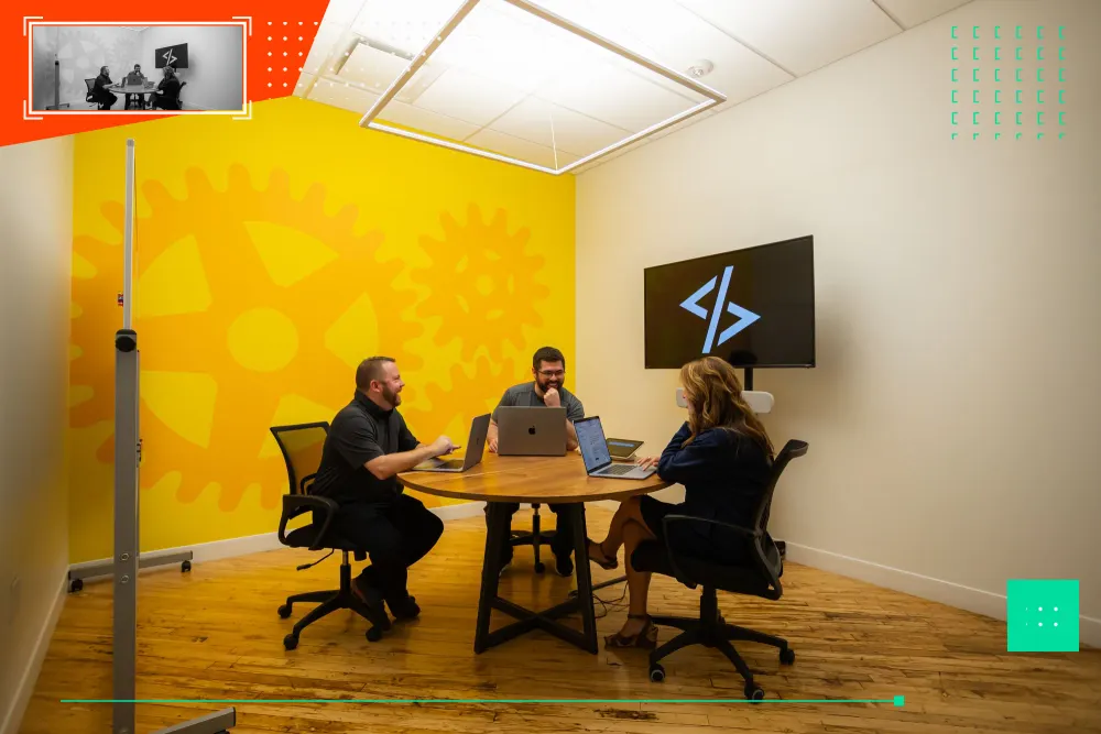WWC team collaborating in the office